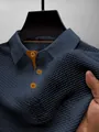 Close-up detail of navy blue men's ice silk mesh polo shirt showing fabric texture. - S / Tops / Navy Blue