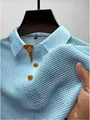 Detailed view of light blue mesh ice silk polo shirt showing breathable waffle texture - S / Tops / Light Blue