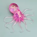 Colorful glittery pink TPR octopus squishy toy for stress relief and sensory play - Pink