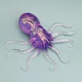 Purple sparkly glitter TPR octopus squeeze toy for stress relief featuring clear tentacles - Purple