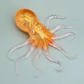 Orange glitter TPR octopus squeeze toy with translucent tentacles for stress relief - Yellow