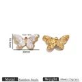 Vintage Schmetterling Anhänger aus Edelstahl mit weißer Muschelstruktur für DIY Schmuck - Geprägter Schmetterlingsstil / Gold