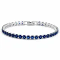 Elegant silver-toned tennis bracelet featuring round deep blue cubic zircon stones - Tennis Chain / 17cm / Silver Base - Deep Blue Zirconia
