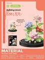 DIY pink and purple building block flower ornament set with 302 pieces and display base. - 7241 Spring Flowers In Full Bloom - Includes Dust Cover