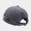 Vintage grey canvas docker hat with adjustable metal buckle and side patch. - Adjustable / EST1973 Patch Haze Blue