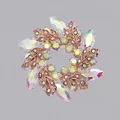 Spilla a corona con cristalli iridescenti scintillanti in finitura oro rosa - Stile Strass AB Oro Rosa