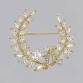 Elegante spilla a corona di alloro dorata con scintillanti cristalli trasparenti - Stile Foglia di Alloro Dorato