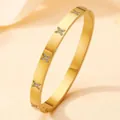 Elegante 18k goud vergulde titanium stalen armband met sterbloem kristallen - Gouden Verstrengelde Strass Stijl