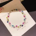 Elegant gold-plated bracelet with multi-colored round zircon stones in a floral design - 4# Bracelet / Gold Multicolor