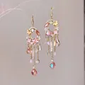 Elégantes boucles d'oreilles pendantes à pampilles en cristal rose avec accents dorés. - Crochets d'Oreilles à Glands en Forme de Couronne Rose de Luxe Doux (56#) / Or-Rose