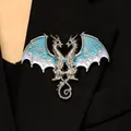 Detailed view of fantasy double-headed dragon brooch with blue gradient enamel wings - Dragon Brooch (10527) / Blue