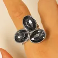 Elegant vintage silver ring featuring three oval faceted black acrylic stones on finger - Silver Black Stone Oval Diamond Ring (09)