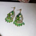 Close-up of bohemian water drop earrings with green crystals and flower motifs - Streaming Flower Tassel (54# 925 Sterling Silver Earring Post-Gold) / Green
