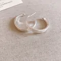 Minimalistische zilveren onregelmatige oorringen met een getextureerd ontwerp - Rimpel Lava Oorring (46#)