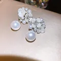 Elegante zilveren bloemoorbellen met druppelparels en fonkelende kristallen - Schelpbloem Waterdruppel Parel (50#)