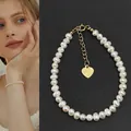 Elegant Baroque freshwater pearl bracelet featuring a golden heart charm and lobster clasp - Bracelet Style L bp3.5-4mm (17+3cm)