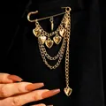 Elegant gold multi-layer chain brooch featuring shiny heart charms on a punk style safety pin - Multi-layer Heart Tassel Style (KC Gold 5415)