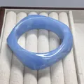 Stylish wavy blue marbled resin bangle bracelet for women with elegant glossy finish - Sky Blue Swirl