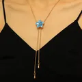 Detailed close-up showing a blue flower enamel pendant on an adjustable gold snake chain necklace - Enamel Flower Style (11230) / Blue