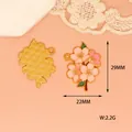 Detailed view of a cherry blossom enamel charm with 29x22mm size and 2.2g weight. - Sakura (M-045) / Cherry Blossom