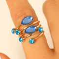 Adjustable spiral gold ring with marquise and round blue gemstones in French style - Ring (M-604)