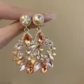 Boucles d'oreilles style palais vintage avec cristaux champagne et finition dorée - 61# Gland Éventail Floral Goutte d'Eau