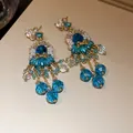 Boucles d'oreilles vintage de luxe à pampilles en cristal bleu avec perles et fleurs - 68# Gland Perle Éventail Gemme Bleue