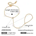 Gold stainless steel finger bracelet with white pearls and sparkling zircon - Pearl and Rhinestone Accented Style (JDB0304301)