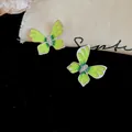 Elegant green enamel butterfly stud earrings with sparkling rhinestones for women - Stud Earrings / Green