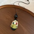 Detail of ethnic style necklace with wood, hemp rope, buttons and green tassel detail. - Button Tassel Ethnic Style (10#) / Black