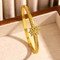 Elegant bohemian gold stainless steel bangle featuring a sparkling rhinestone flower motif - Eight Petal Flower Rhinestone (07 Gold)