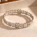 Vintage bohemian silver stainless steel bangle with floral clover pattern design. - Four Leaf Clover Flower (20 Silver)