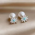 Elegant Korean style white daisy flower and pearl stud earrings on gold silk background - Blue