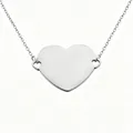 Close-up view of a mirror polished stainless steel heart pendant for DIY laser engraving - Steel
