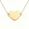 Macro view of a golden mirror finish heart pendant necklace ideal for custom DIY engraving - Gold