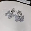 Detailed view of sparkling zircon butterfly ear clips with comfortable non-pierced design. - 6# Ear Clip-Silver