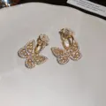 Close-up detail of golden butterfly clip-on earrings with sparkling pavé zircons - 5# Ear Clip-Gold