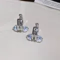 Macro close-up detail of sparkling zircon butterfly hoop earrings in silver setting - 8# Hoop Earring-Silver