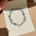 Elegante pulsera de flores de circón azul hielo con piedras en forma de gota - Estilo de Gota de Flor Hueca (16#)