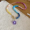 Detailed view of colorful crystal beaded necklace with purple resin flower pendant. - Purple (32#)