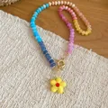 Detailed view of vibrant multi-color crystal beads and yellow flower pendant necklace - Yellow (35#)