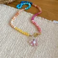 Close-up of colorful crystal beaded necklace with translucent pink flower pendant. - Multicolor-Pink (29#)
