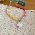 Macro detail of colorful crystal beaded necklace featuring a white flower pendant. - Multicolor-White (27#)