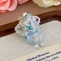 Ciondolo per scarpe a fiore in resina trasparente e perle blu per zoccoli stile principessa - Pendente a Goccia con Perline Blu e Bianco (27337-13)