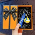 Miniature volleyball keychain with blue strap presented in a premium orange gift box - Volleyball / Orange Gift Box