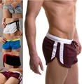 Breathable men's mesh athletic shorts featuring side stripes and adjustable drawstring - Burgundy