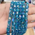 Macro view of 8x9mm blue cylindrical crystal glass beads with AB coating for DIY jewelry - Cylinder / Lake Blue AB