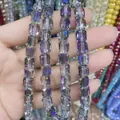Macro view of 8x9mm cylindrical glass crystal beads with iridescent AB coating. - Cylinder / Semi-transparent Purple
