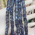 Macro view of faceted 8x9mm dark blue cylindrical glass crystal beads for DIY - Cylinder / Ink Blue