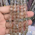 Detailed view of 8x9mm faceted cylindrical glass crystal beads for DIY jewelry - Cylinder / Silver Champagne